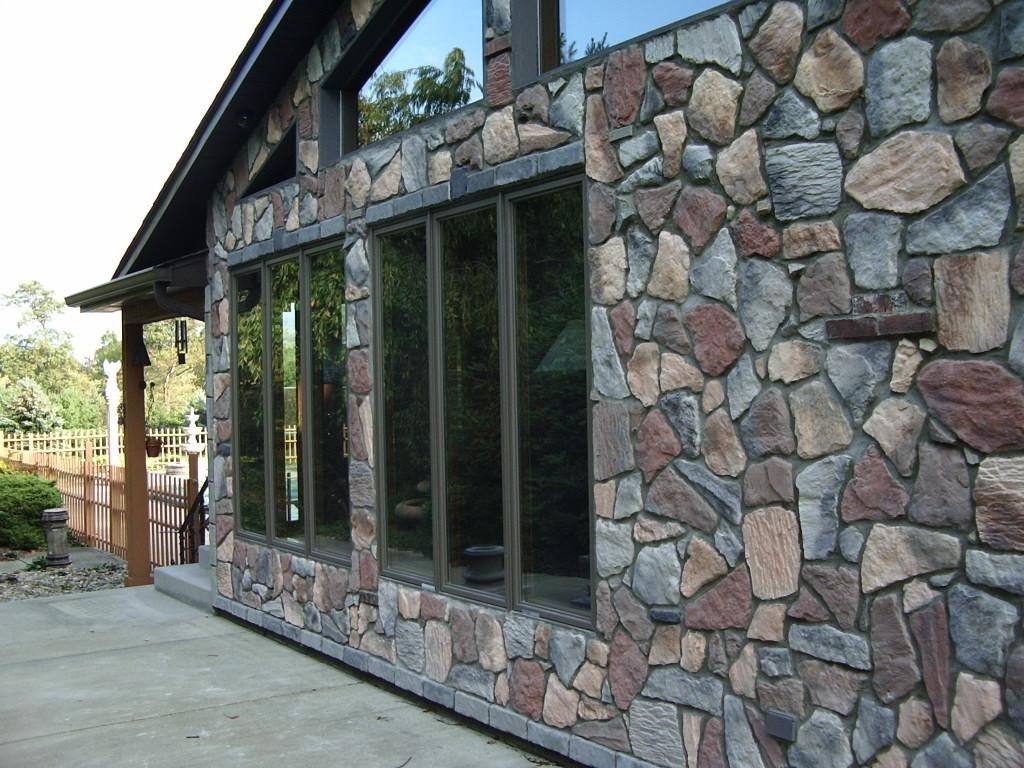 Облицовка фасада камнем: наружная отделка частного дома декоративным камнем при помощи морозостойкого клея